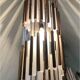Walnut and plexiglass tube pendant light
