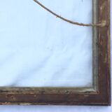 Gilded wooden frame and its glass
