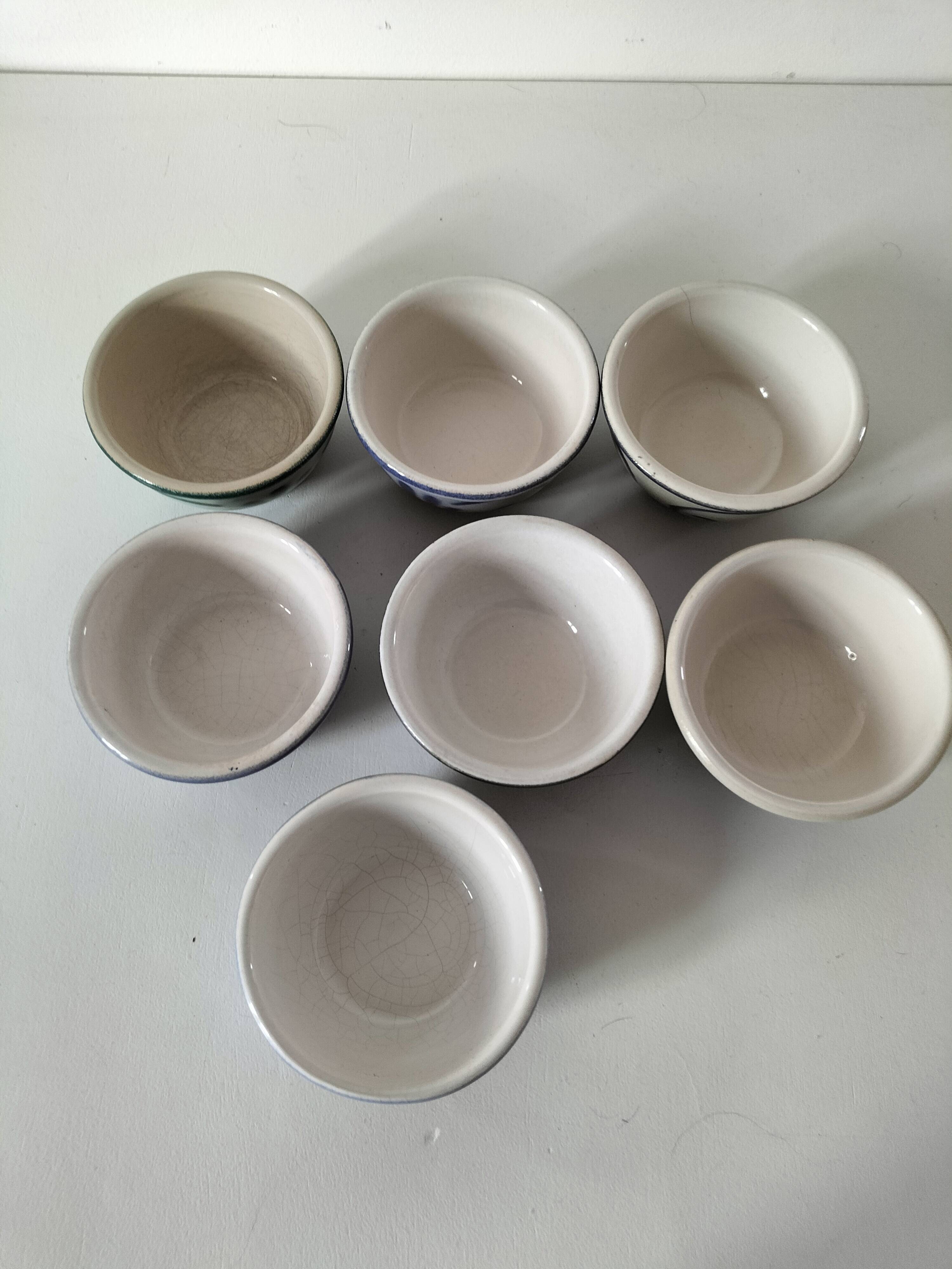 7 stoneware bowls with blue and green ocean-inspired decoration