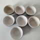 7 stoneware bowls with blue and green ocean-inspired decoration