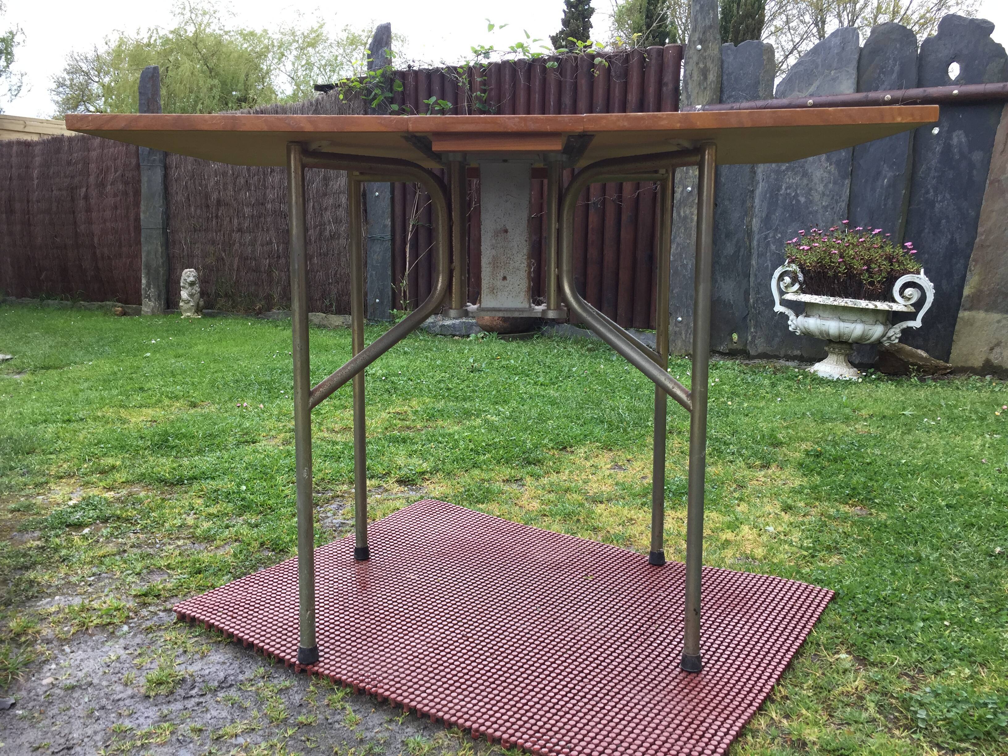 Vintage folding table with teak flaps said wallet with metal tubular base
