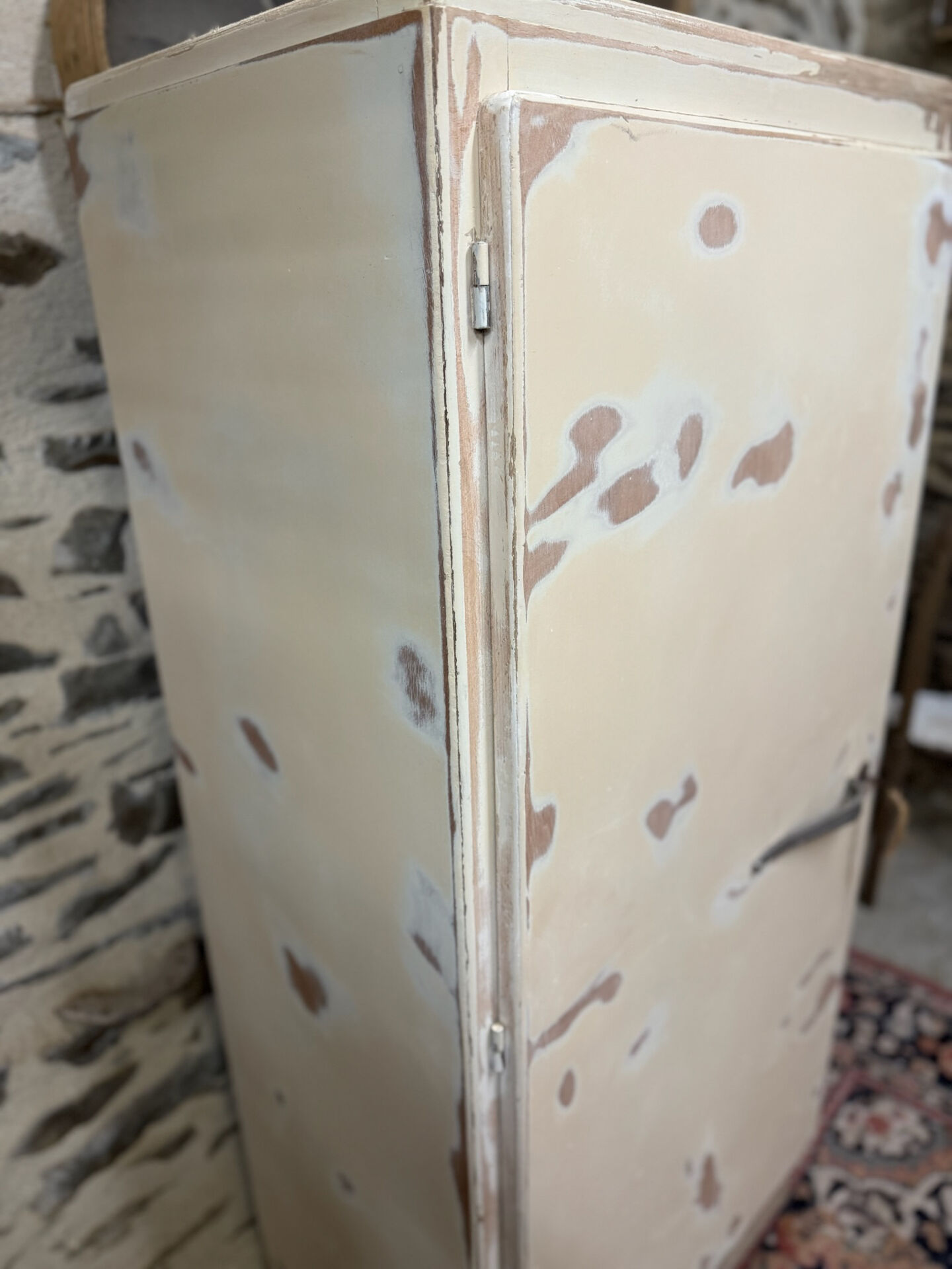 Small one-door Art Deco cabinet with a patina.
