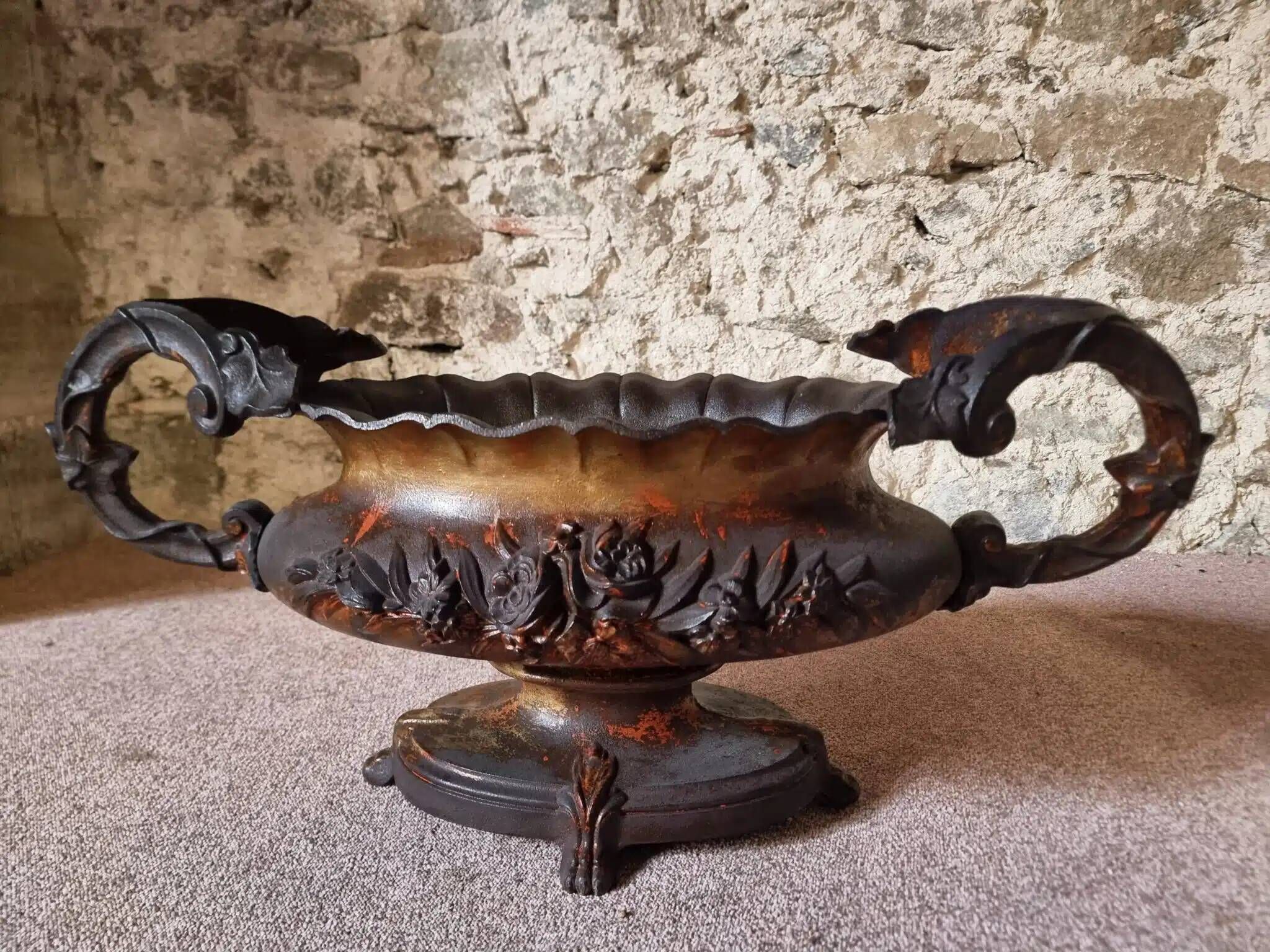 Large antique cast iron planter on a stand, brown-gold patina, France, circa 1900.