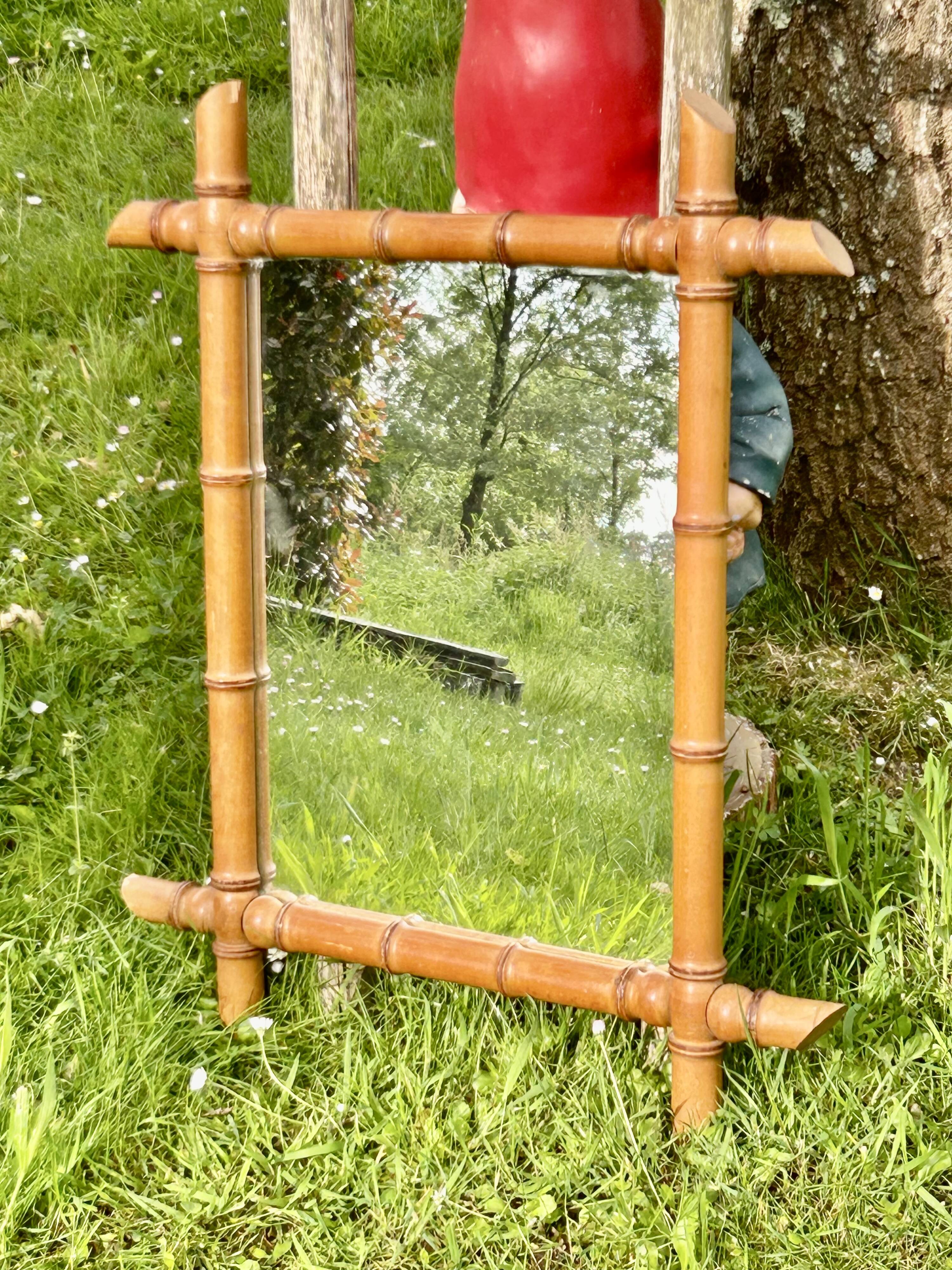 Large format for this type of faux bamboo mirror 70 cm.