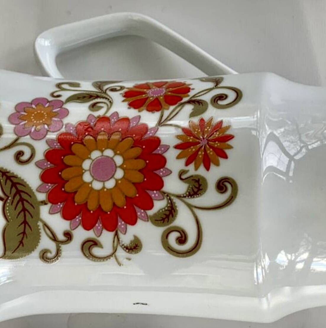 1970s orange floral pattern milk jug, Laura design