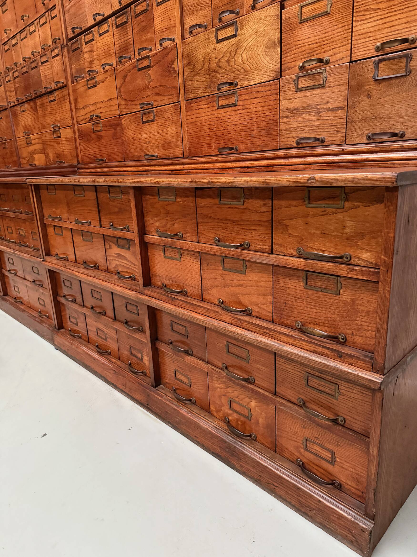 Antique very large American oak grain / apothecary cabinet, ca 1900