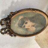 Portrait of a young girl in pastel and beautiful oval frame