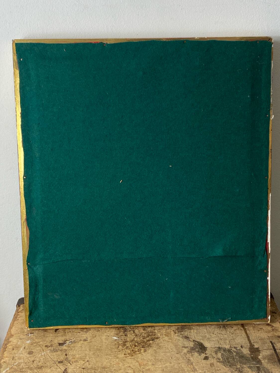 Antique mirror in carved gilded wood