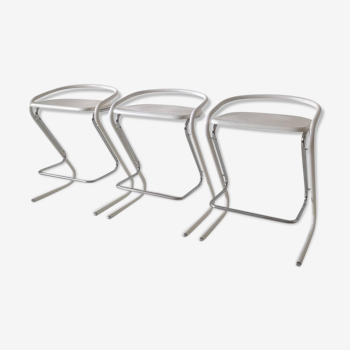 Set of three white and chrome bar stools by Thema Italy to the 1970s