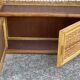 Small vintage 1970s rattan wall shelf with 2 doors.