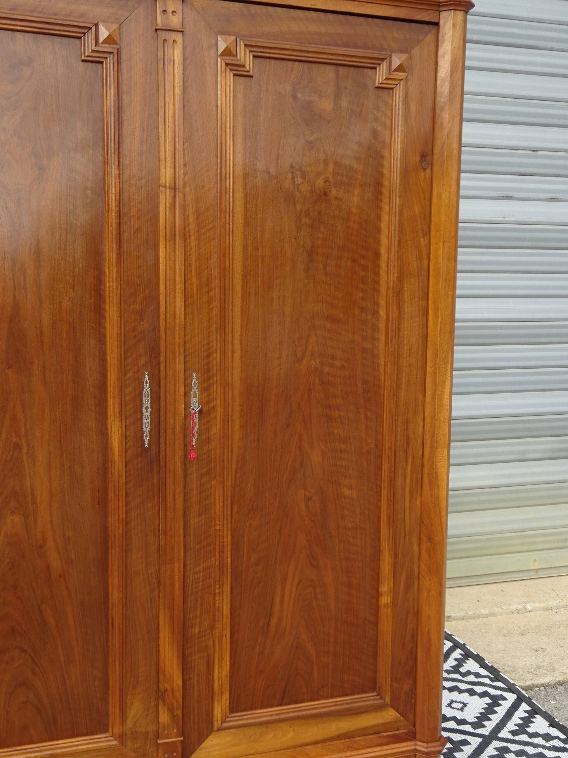 Large antique wardrobe in solid walnut