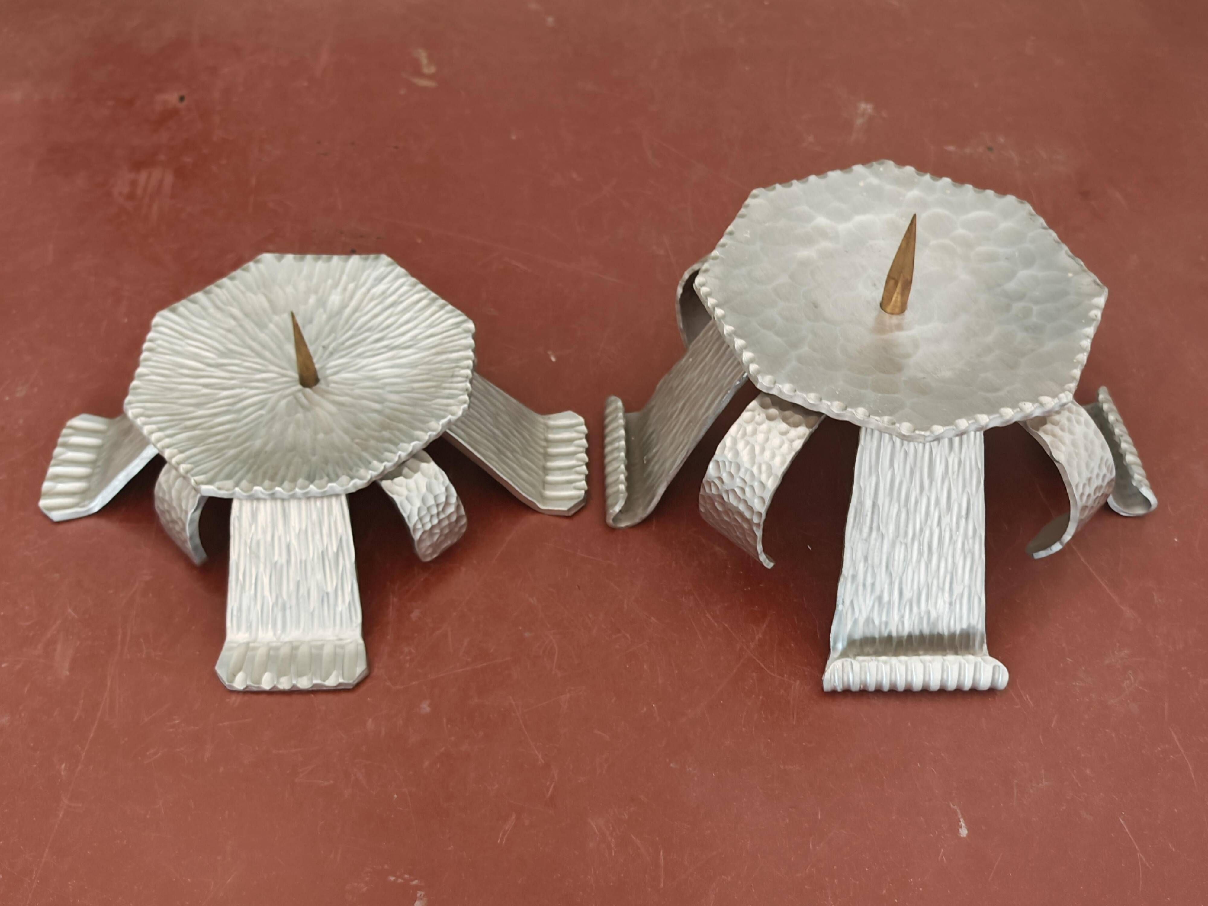 Pair of brutalist hammered aluminium candlesticks, 1970s