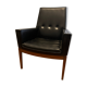 Modernist armchair in wood and black synthetic leather, circa 1960