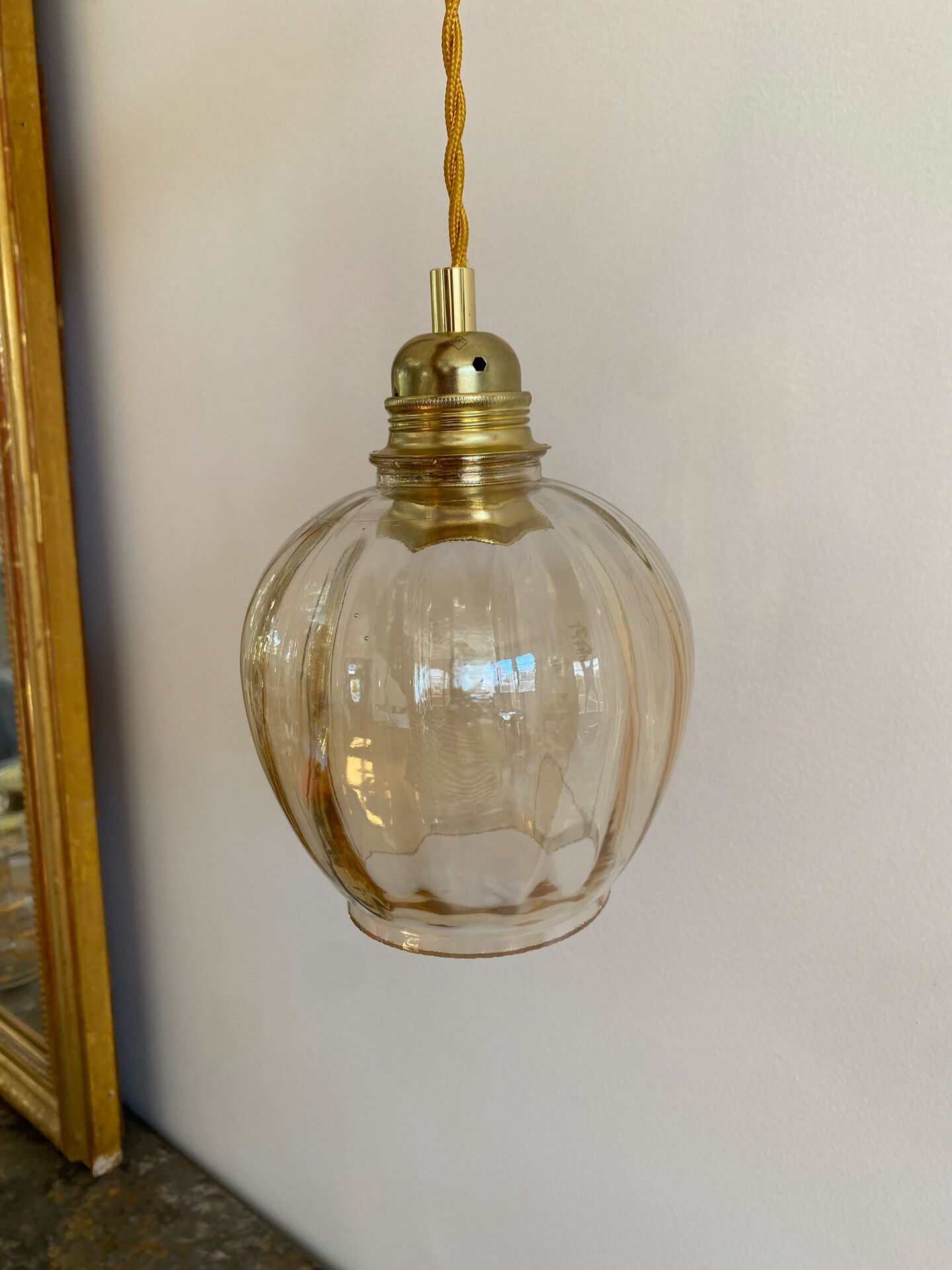 Vintage amber glass suspension globe