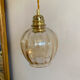 Vintage amber glass suspension globe