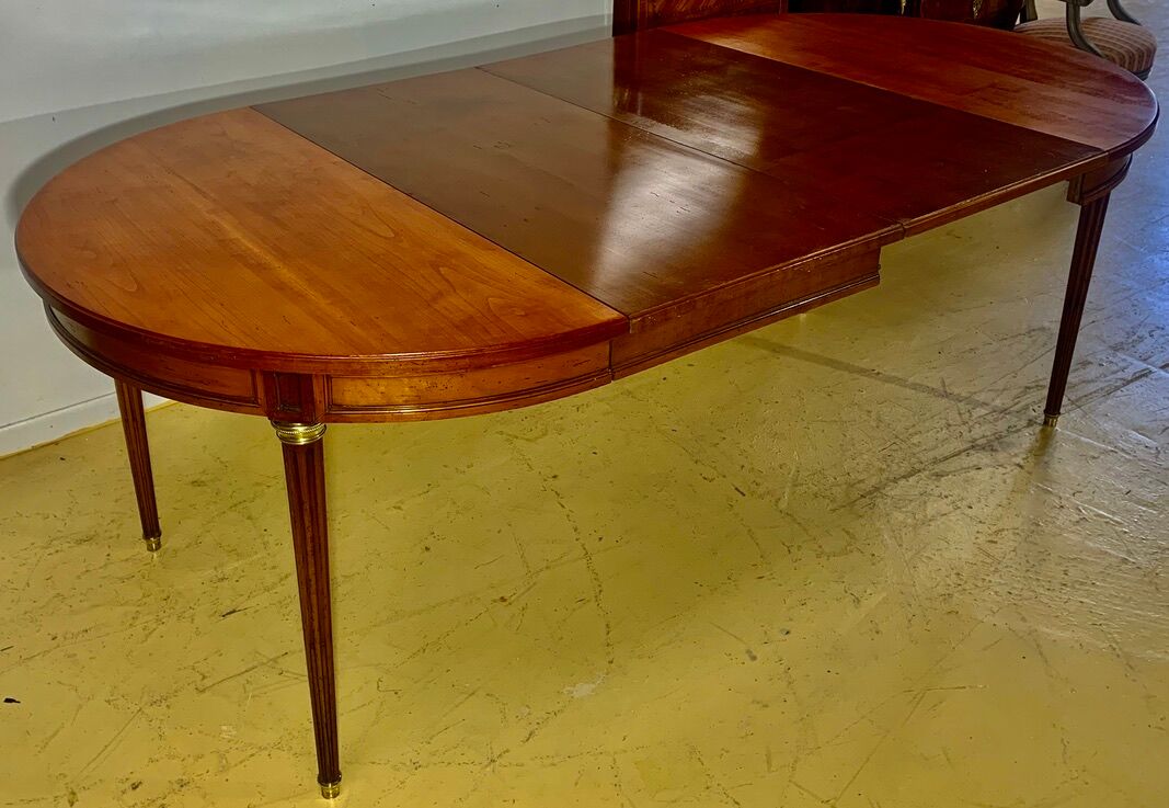 Louis XVI style table in cherry with 2 extensions