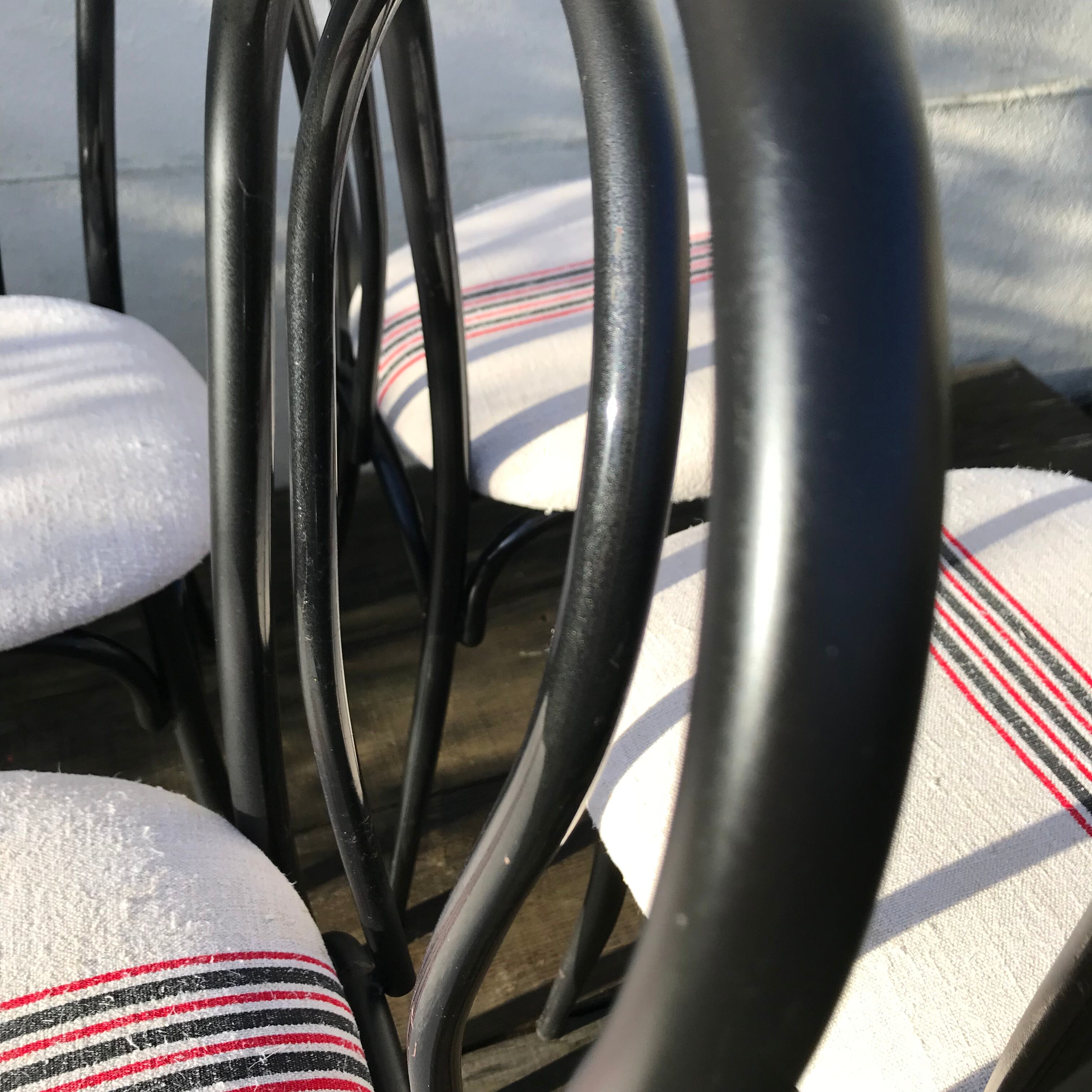 4 vintage black metal bistro chairs