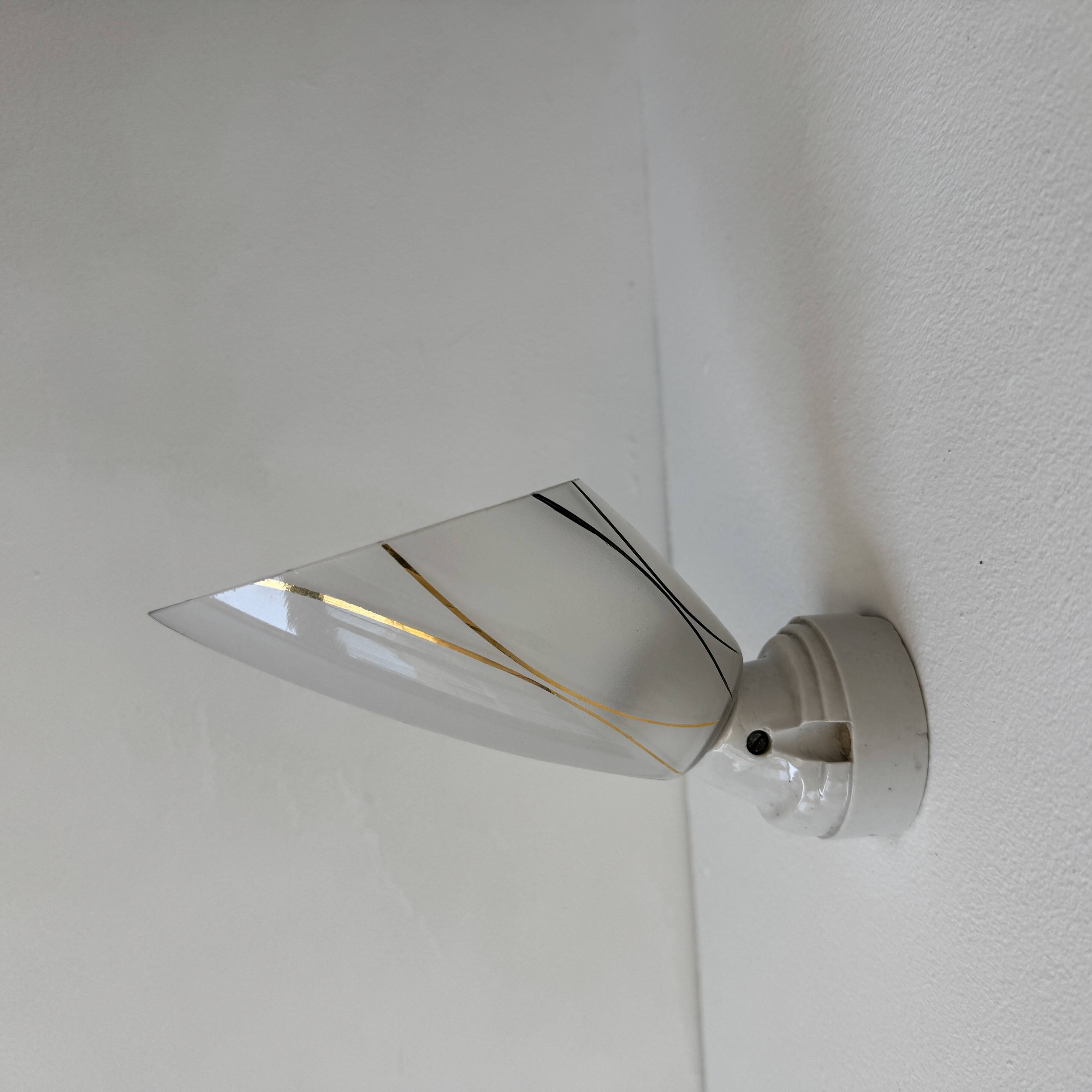 Lot of 3 vintage angled wall lights from the 1950s.