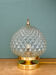 Vintage globe table lamp in moulded glass with diamond points.