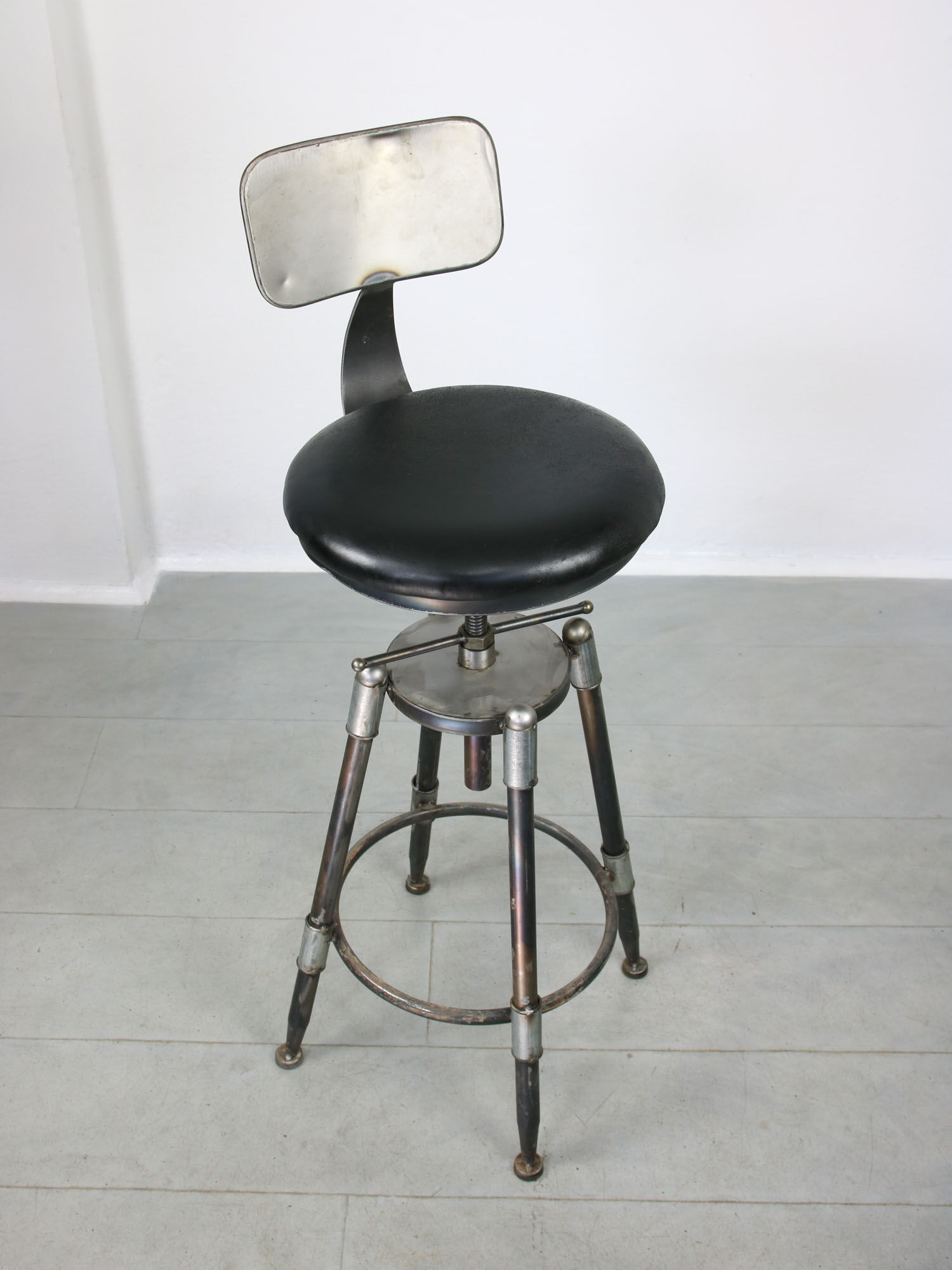 Vintage industrial metal & leather swivel bar stool