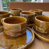 6 stoneware cups and 6 enamel plates
