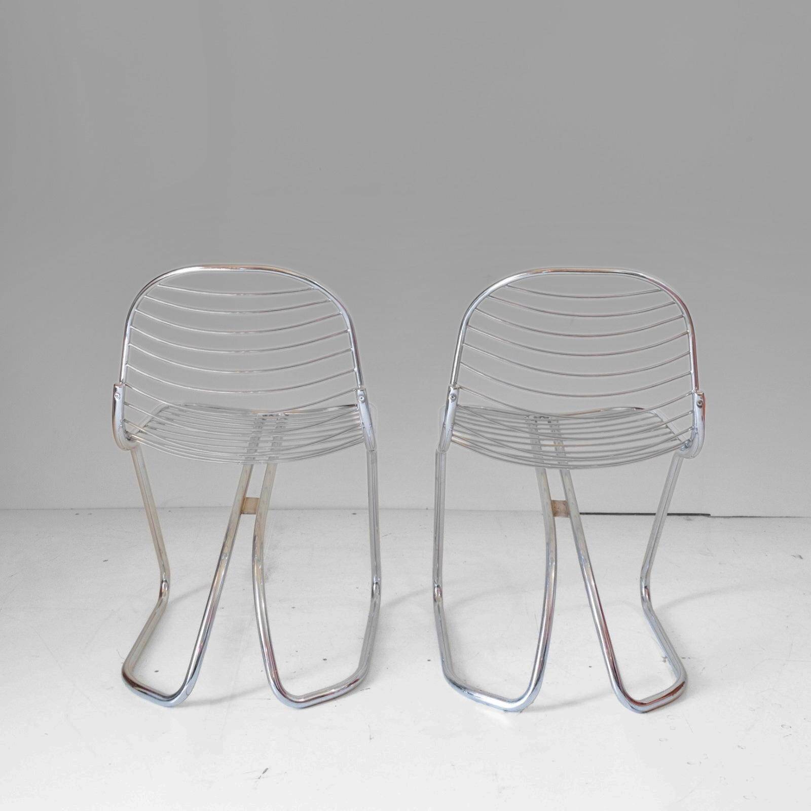 Pair of "Flynn" cantilever dining chairs by Gastone Rinaldi for RIMA, 1970s