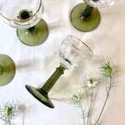 7 Alsace Roemer wine glasses, moss green stepped bases and gold trim.