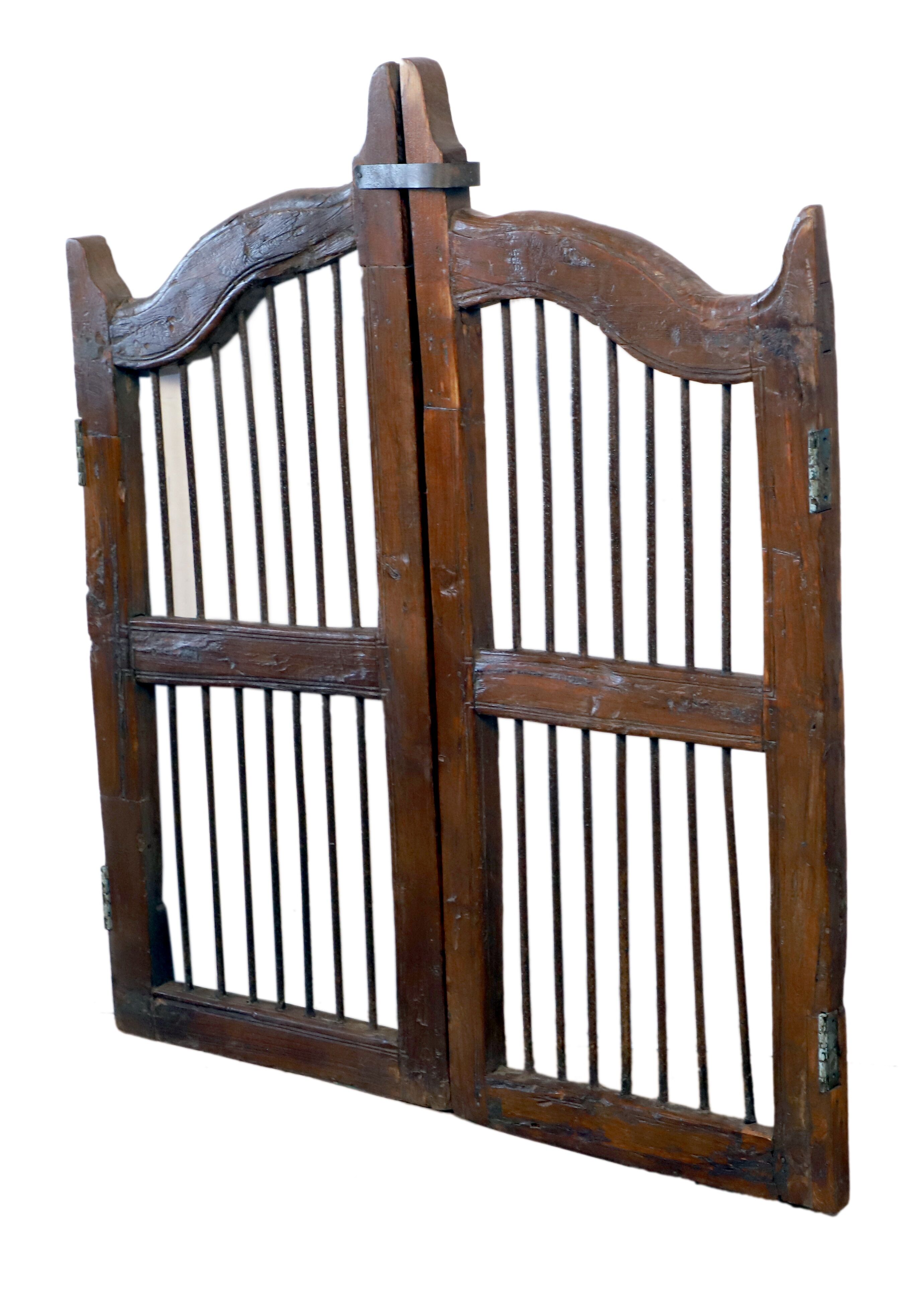 Old Burmese teak gate with openwork wrought iron panels