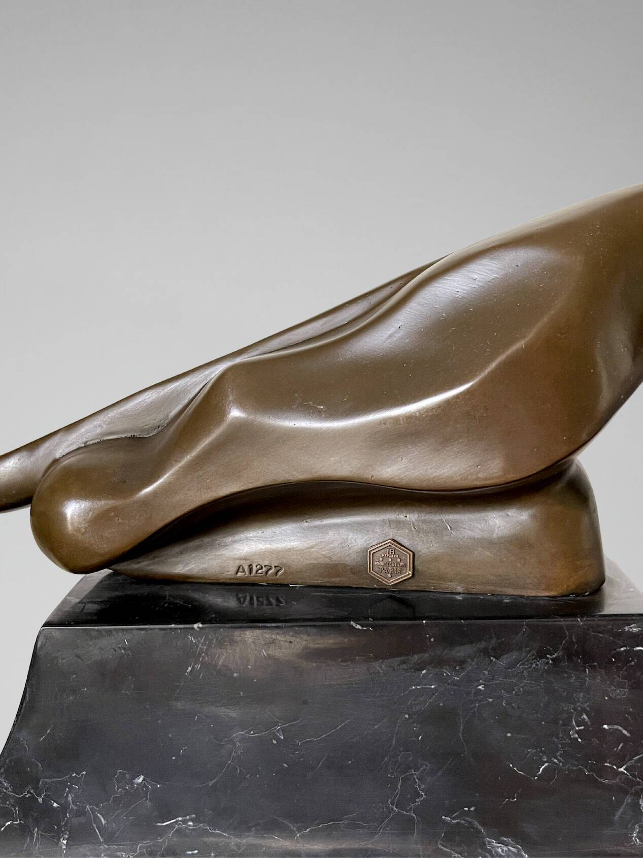 Large Art Deco bronze patinated Jaguar sculpture on an architectural base.