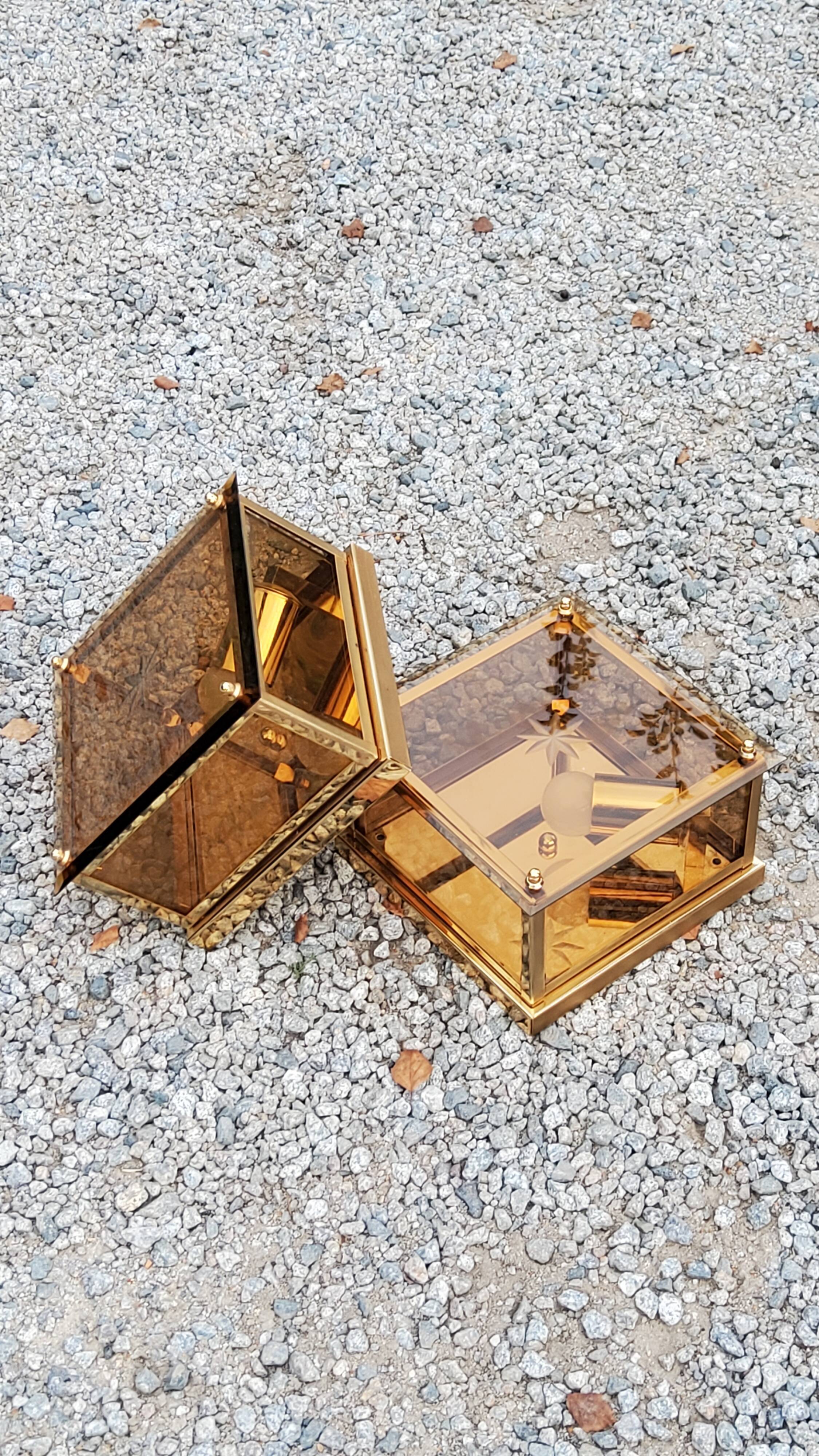 Pair of wall lamps in smoked glass and gilded metal from the 70s/80s