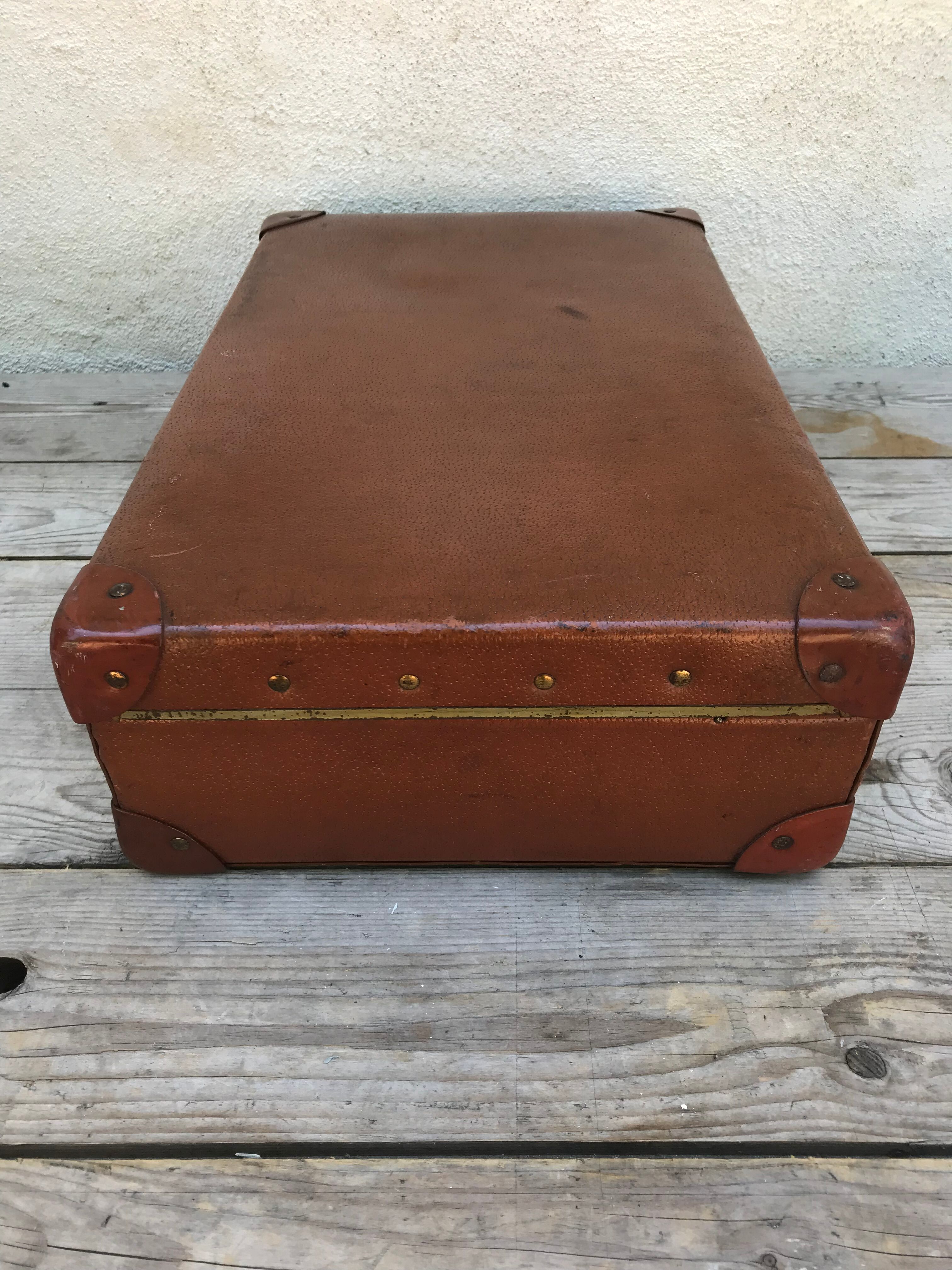 Old suitcase travel ultima brown fiber trunk