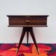 1950s half-moon tripod bedside table