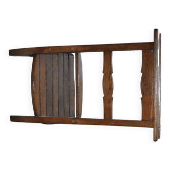 Vintage brown wooden kneeling stool, Hungarian kneeler from the 1940s.