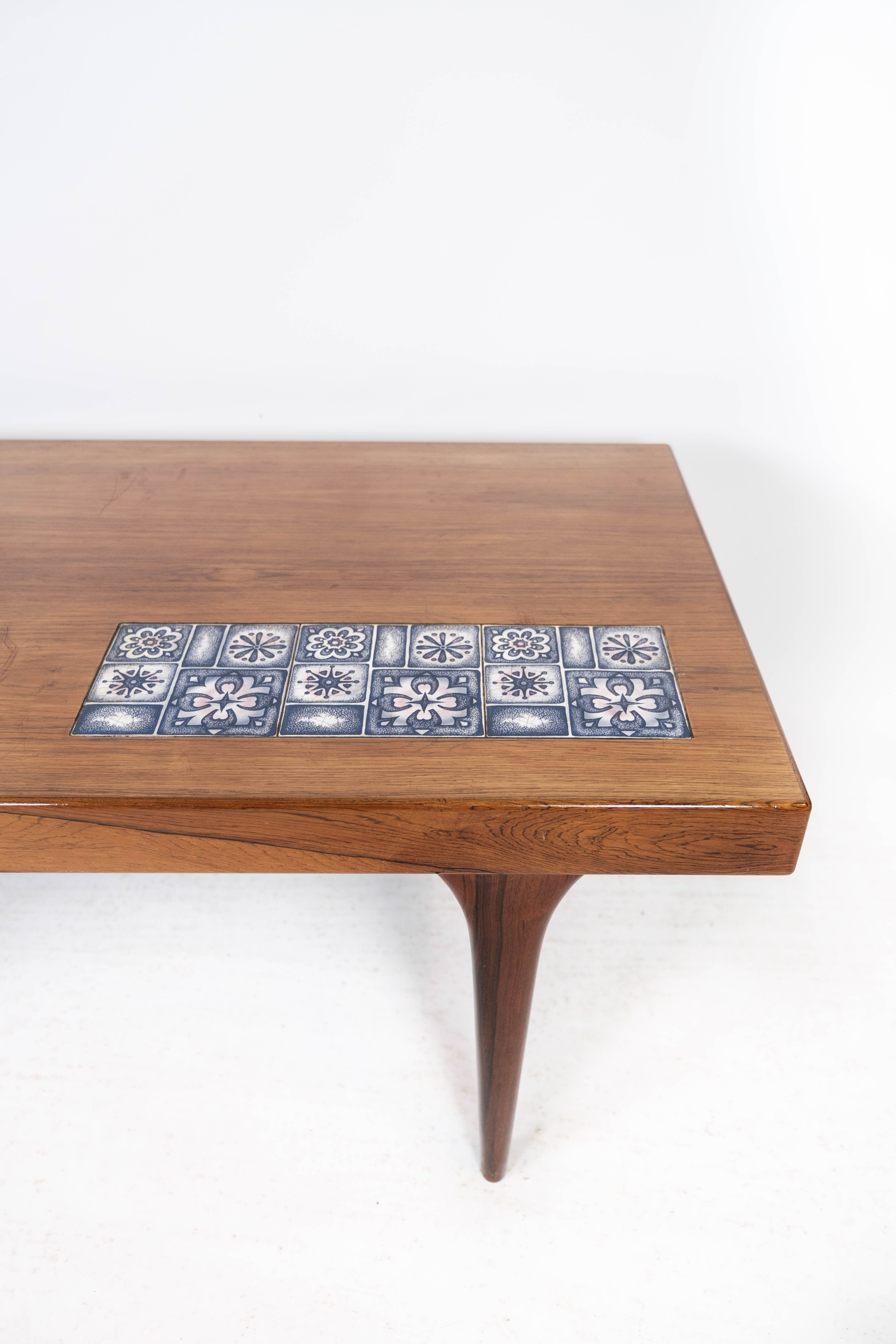 Coffee table in rosewood with blue tiles designed by Johannes Andersen, 1960s