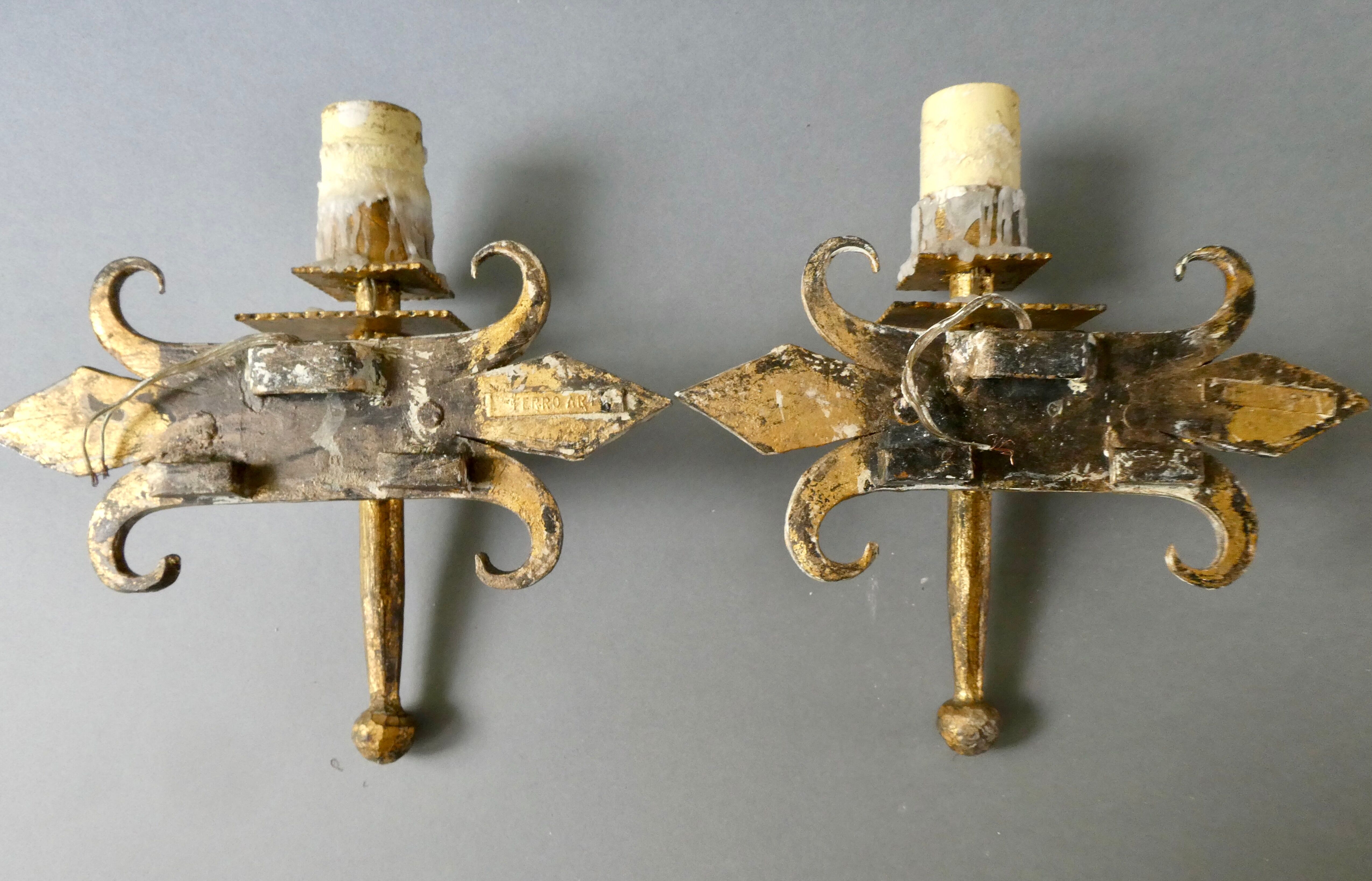 Pair of gold metal wall lamps Ferro Arte, 60s-70s