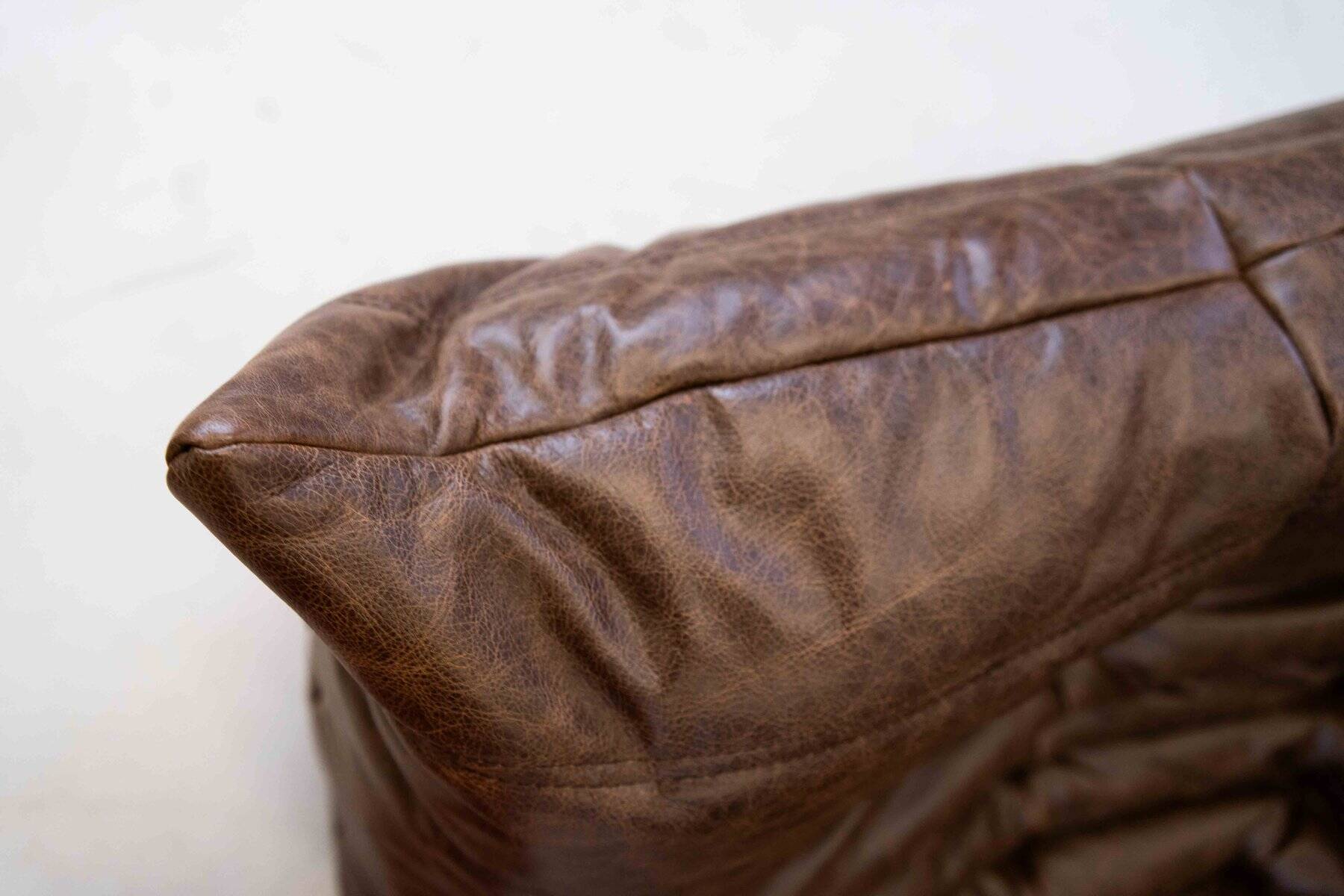 Vintage two-seater Togo sofa with arms in brown leather by Michel Ducaroy for Ligne Roset, 1970s