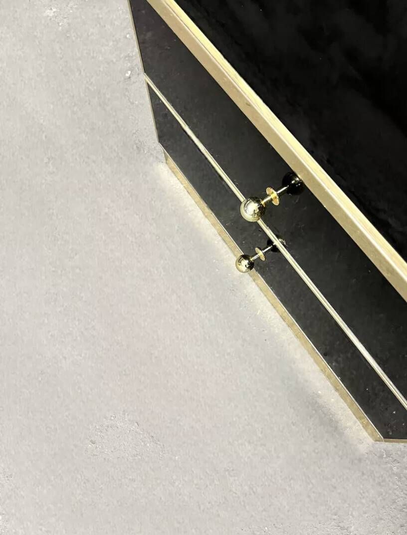 Pair of black lacquered and brass bedside tables, Roche Bobois 1970