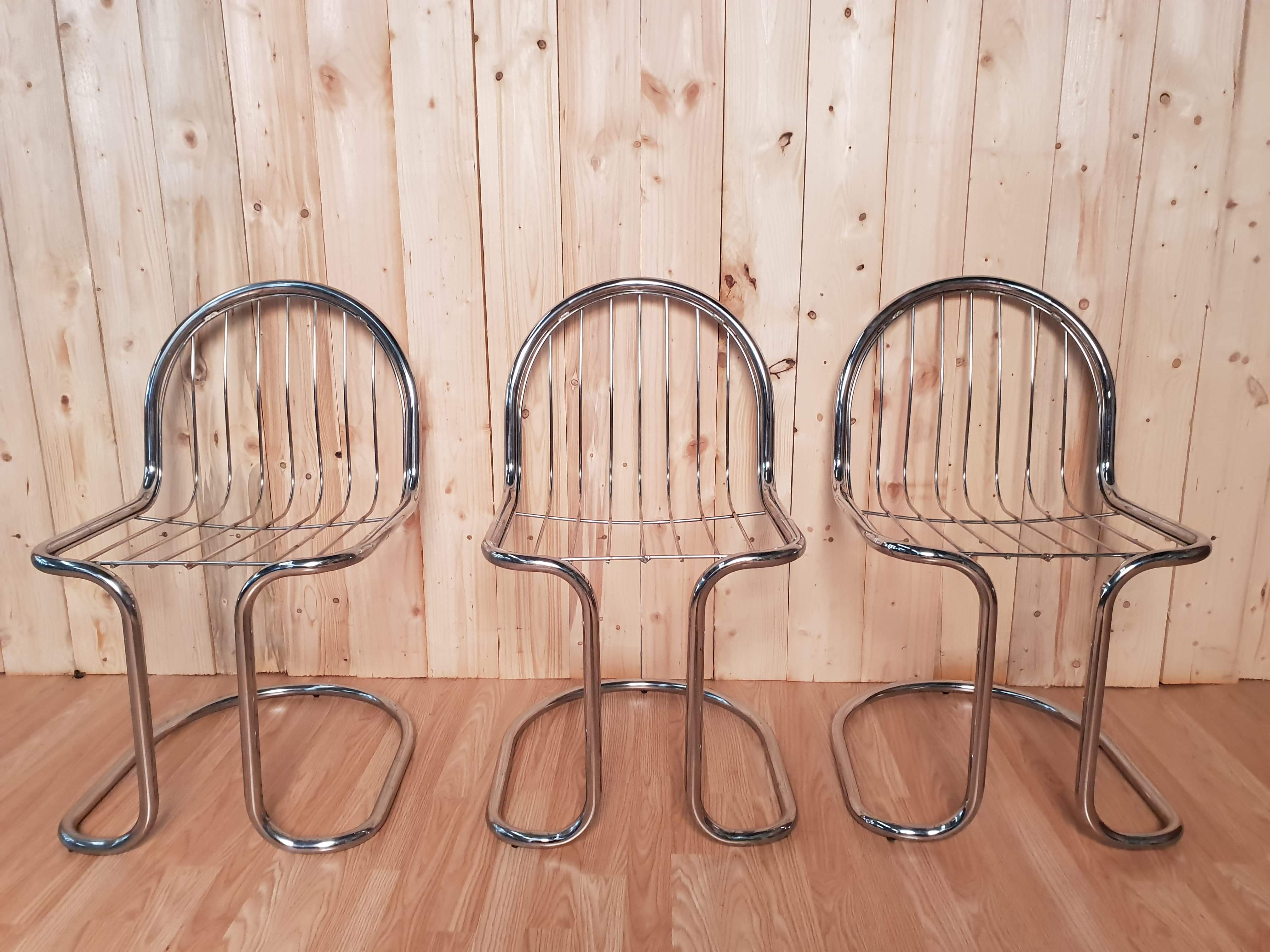 Set of 6 vintage stainless steel rounded chairs
