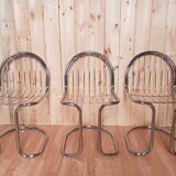 Set of 6 vintage stainless steel rounded chairs