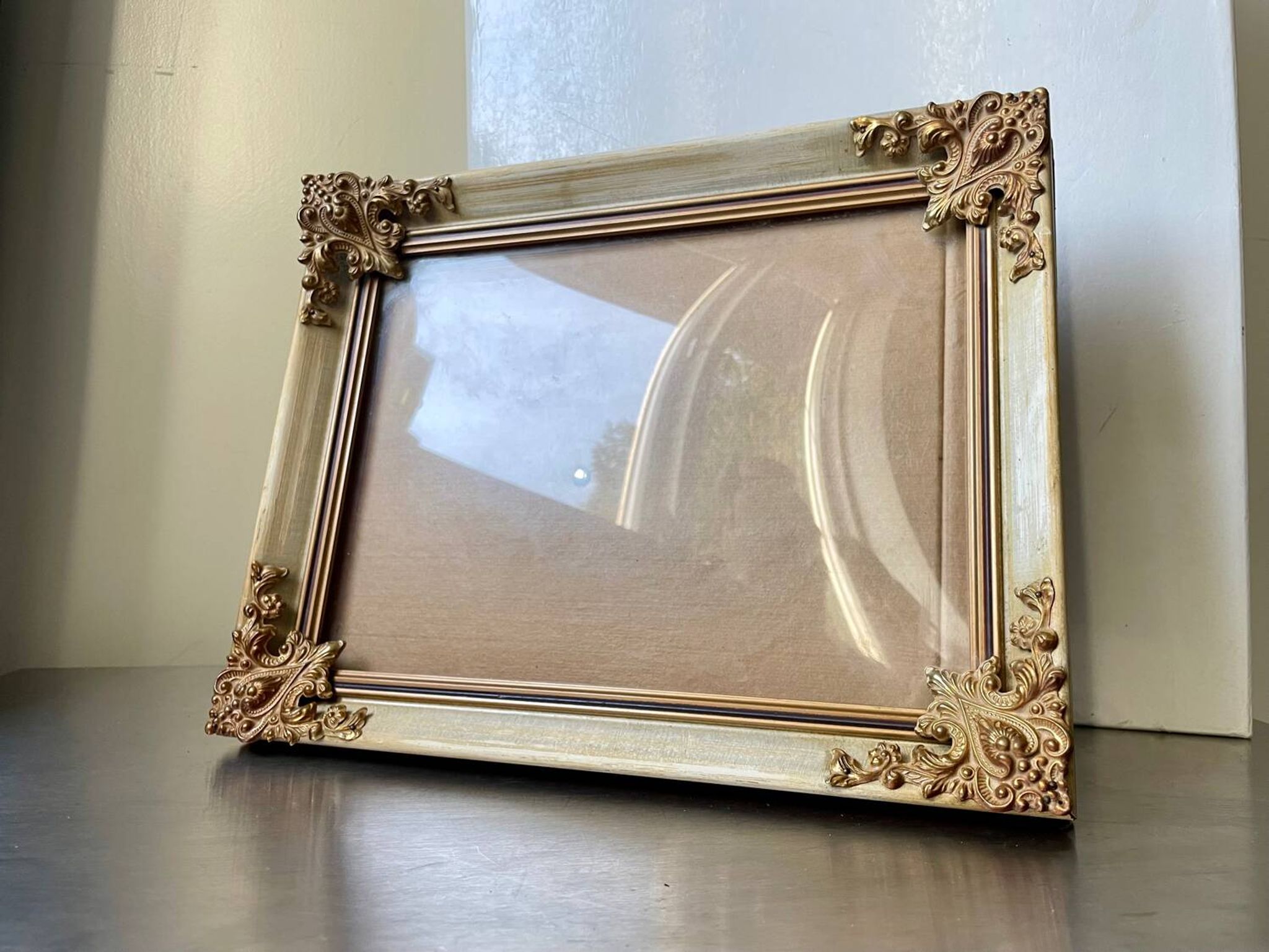 Antique wooden frame with metal gold colored details 28 cm x 22 cm convex glass