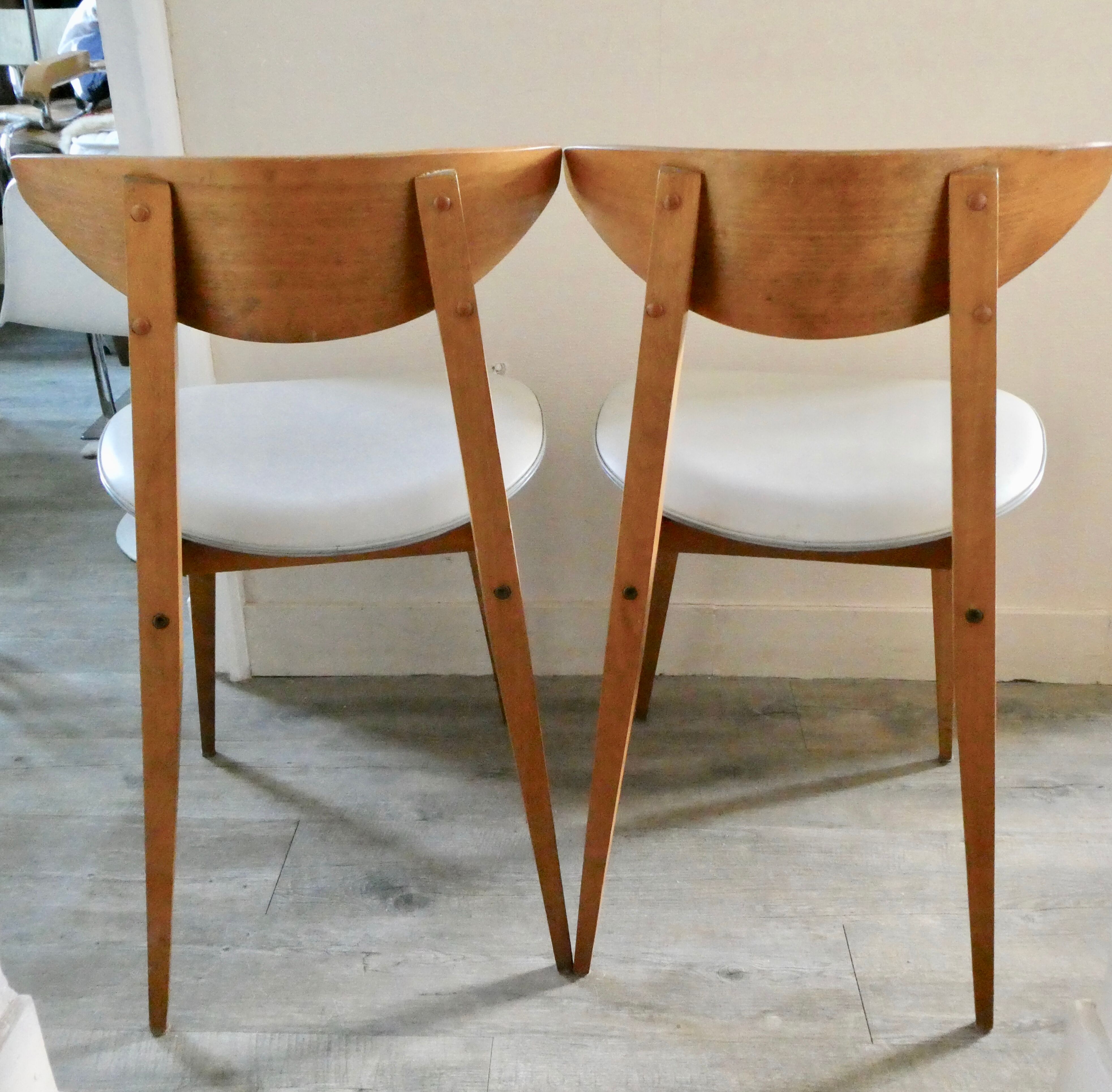 Pair of wooden chairs and skai scandinavian style