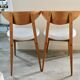 Pair of wooden chairs and skai scandinavian style