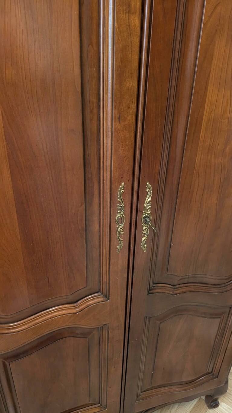 Antique wooden wardrobe in vintage style