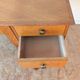 1950s oak double-sided desk with compass legs.
