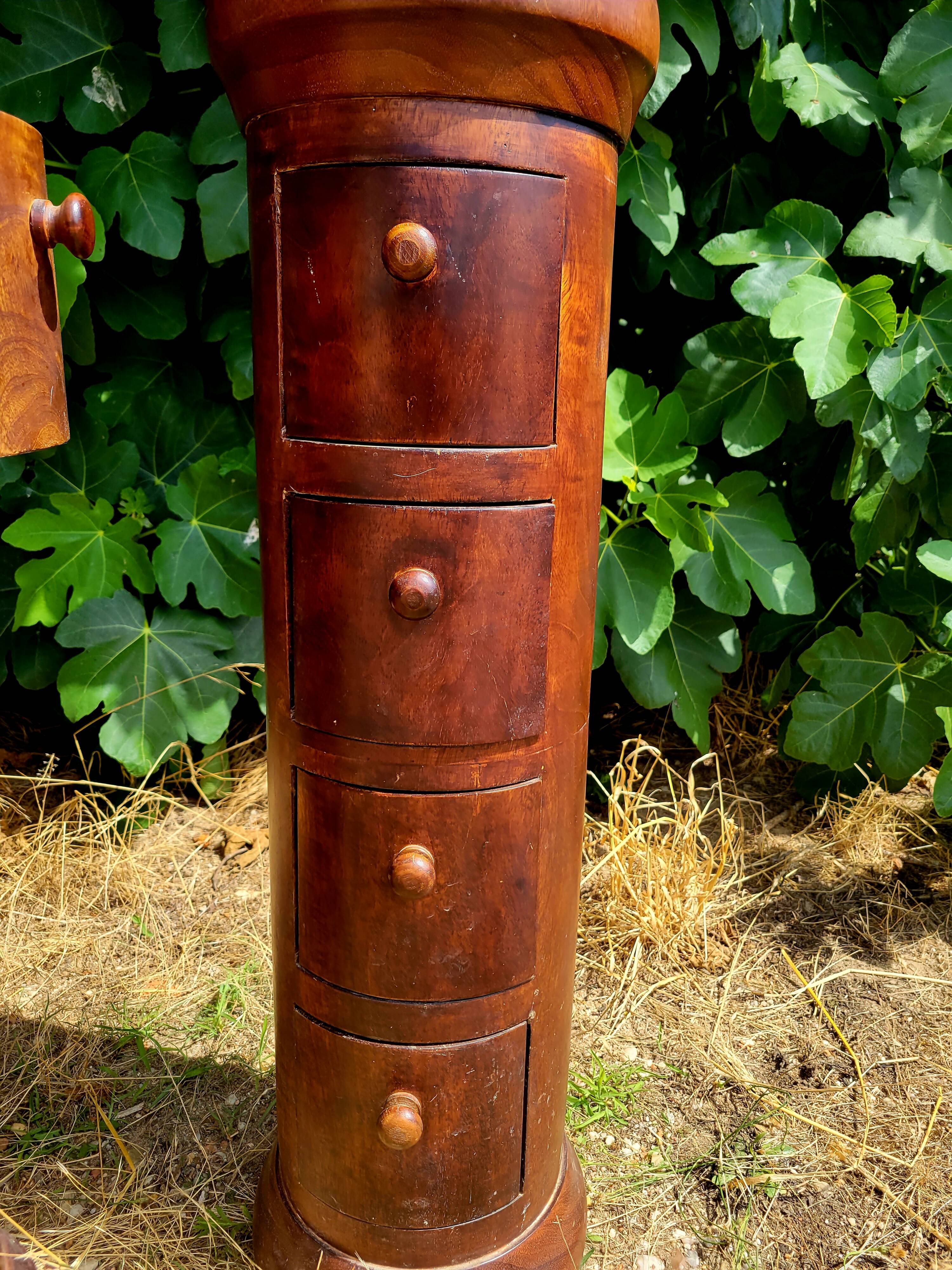 Pair of cylindrical furniture with drawers