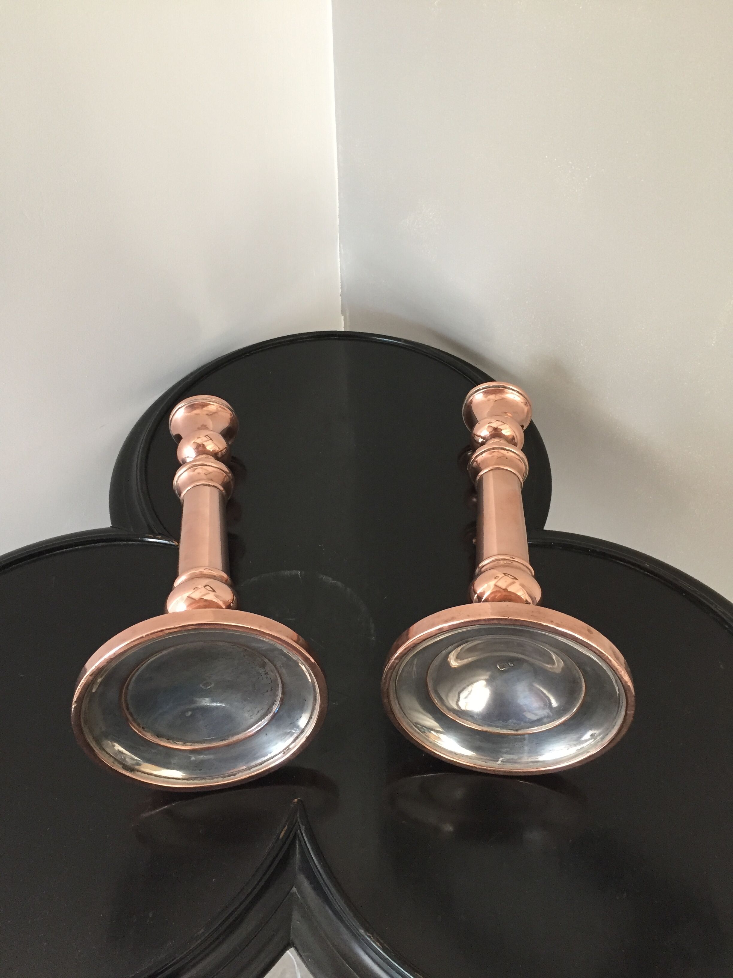 Pair of pink copper candlesticks