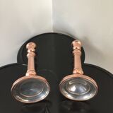 Pair of pink copper candlesticks