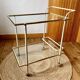 Dessert table with a cream-coloured metal structure and gold brass, 1960s.
