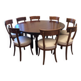 Mahogany round table in Louis Philippe style and 8 period chairs from the early 19th century.