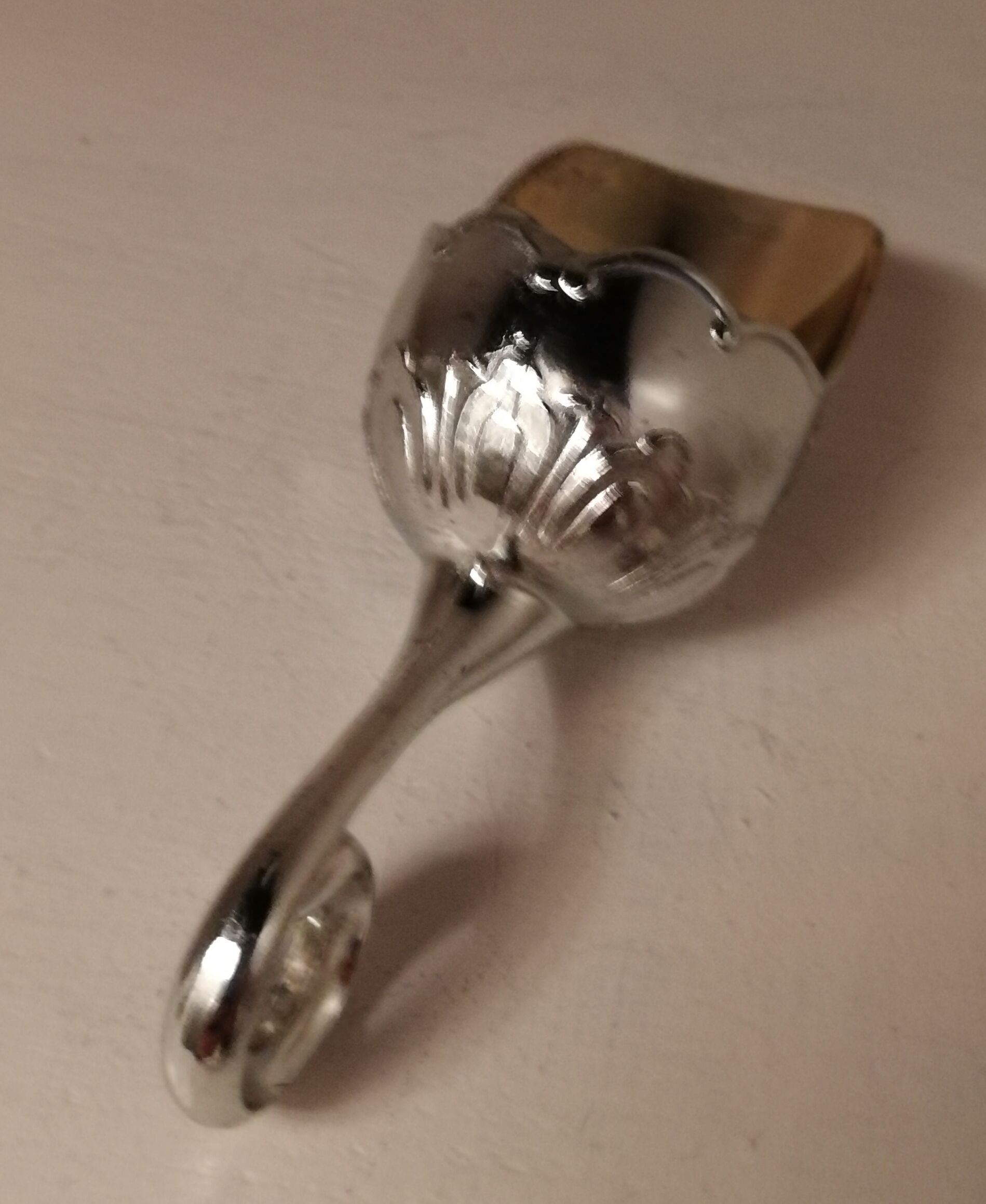 Sugar and sugar shovel in golden silver metal